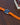 orange rubber fkm watch band on an omega speedmaster pro watch
