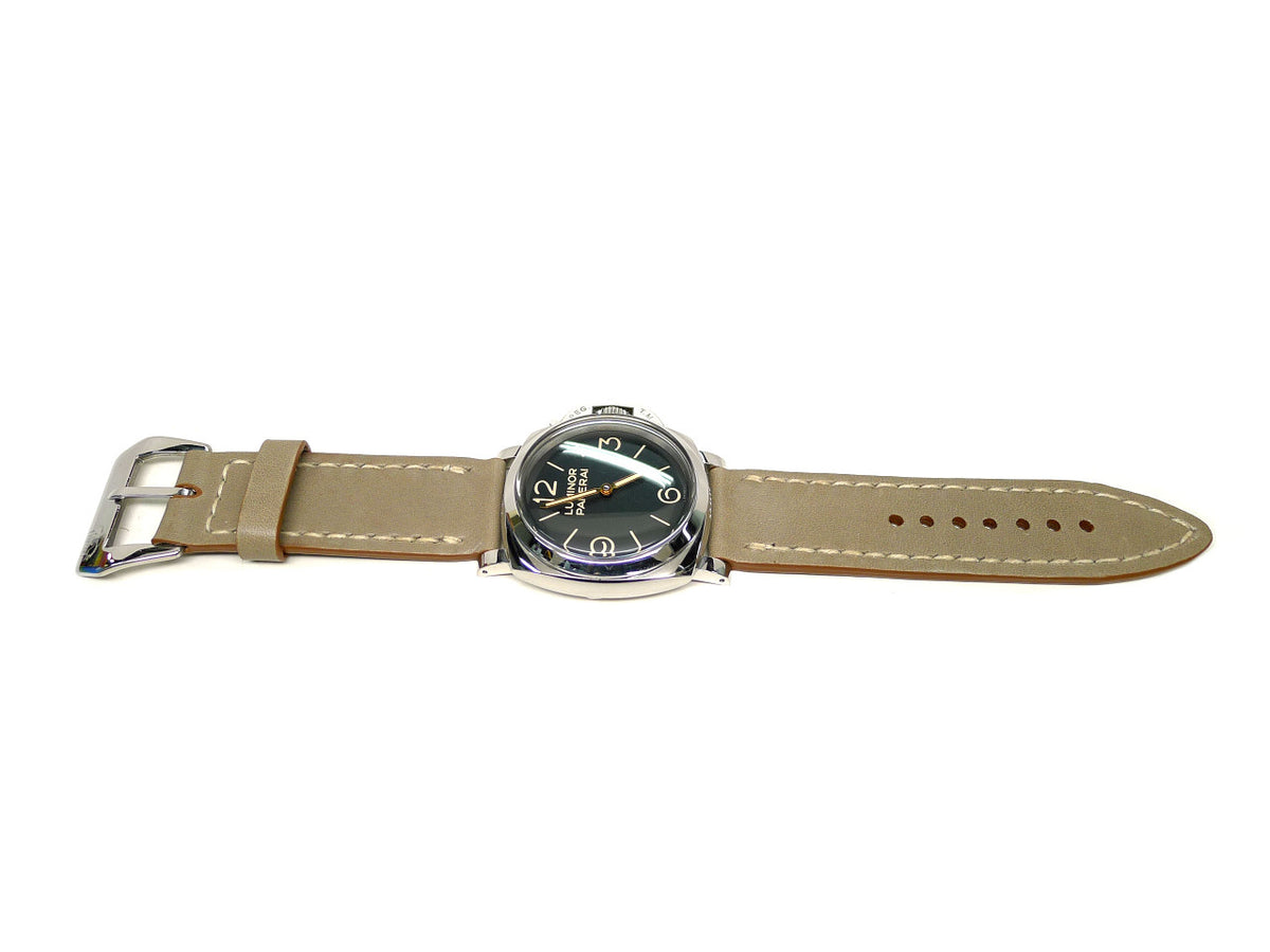 Ekstens watch strap in khaki with cream edge stitching, shown fitted to a watch.