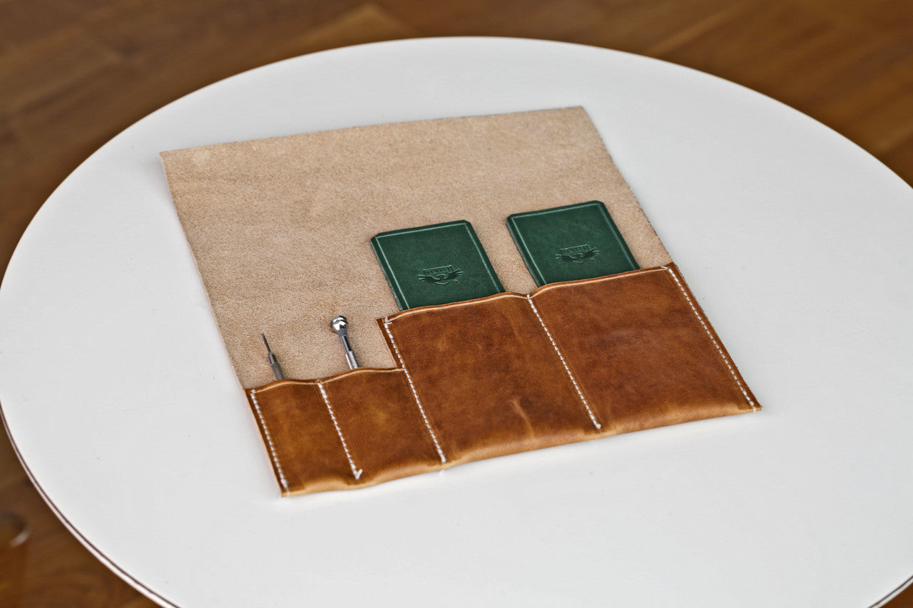 White Table And A Handmade Travel Watch Case From Genuine Horween Natural Dublin Leather By DaLuca Straps.