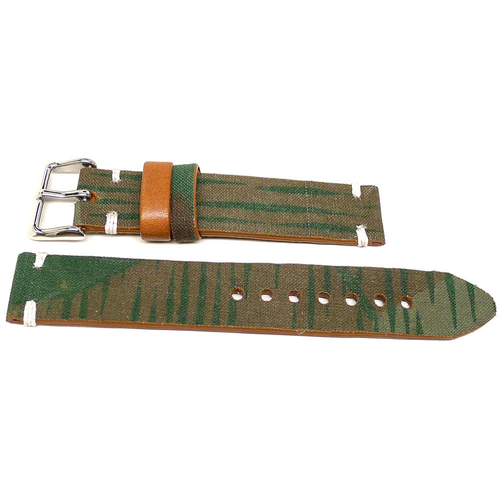 Trench watch strap in green and brown with streaked markings and an orange keeper, two pieces laid flat.