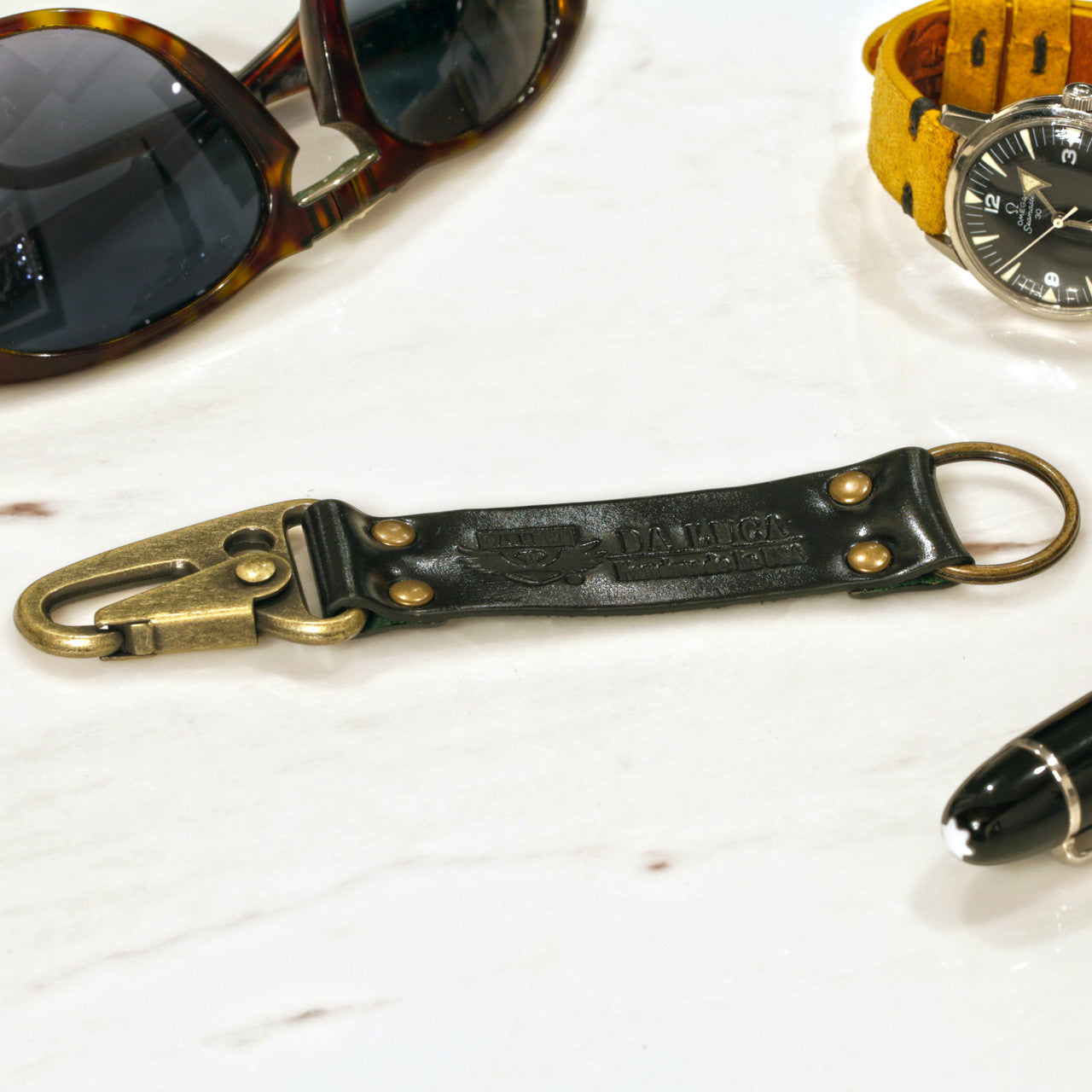 Close View Of Our Keychain Made From Genuine Horween Black Shell Cordovan Leather and Antique Brass Hardware by DaLuca Straps.
