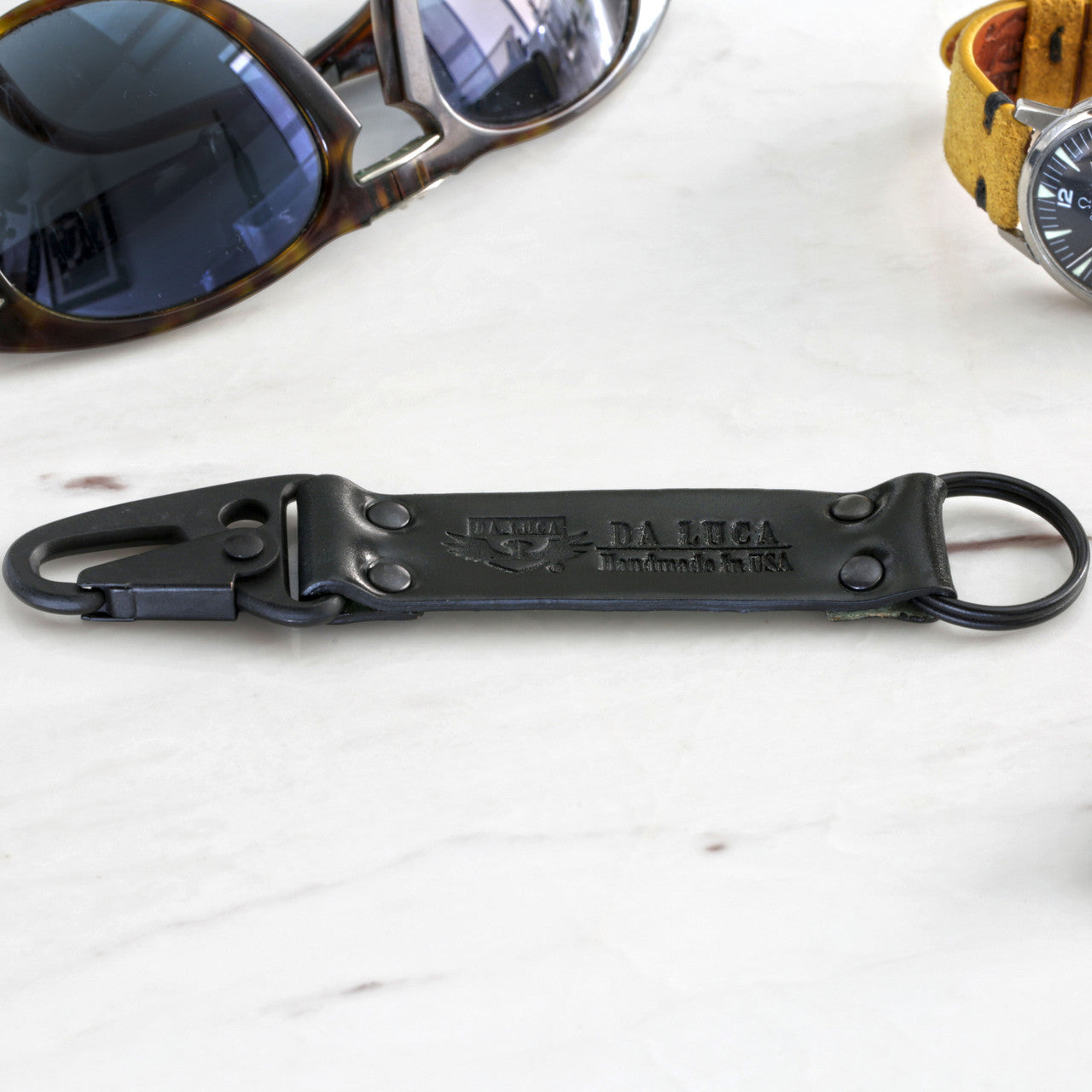 Close View Of Our Keychain Made From Genuine Horween Black Shell Cordovan Leather and PVD Hardware by DaLuca Straps.