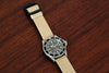 Braided Nylon Perlon Watch Strap Sand PVD Buckle Wood Angle By DaLuca Straps.