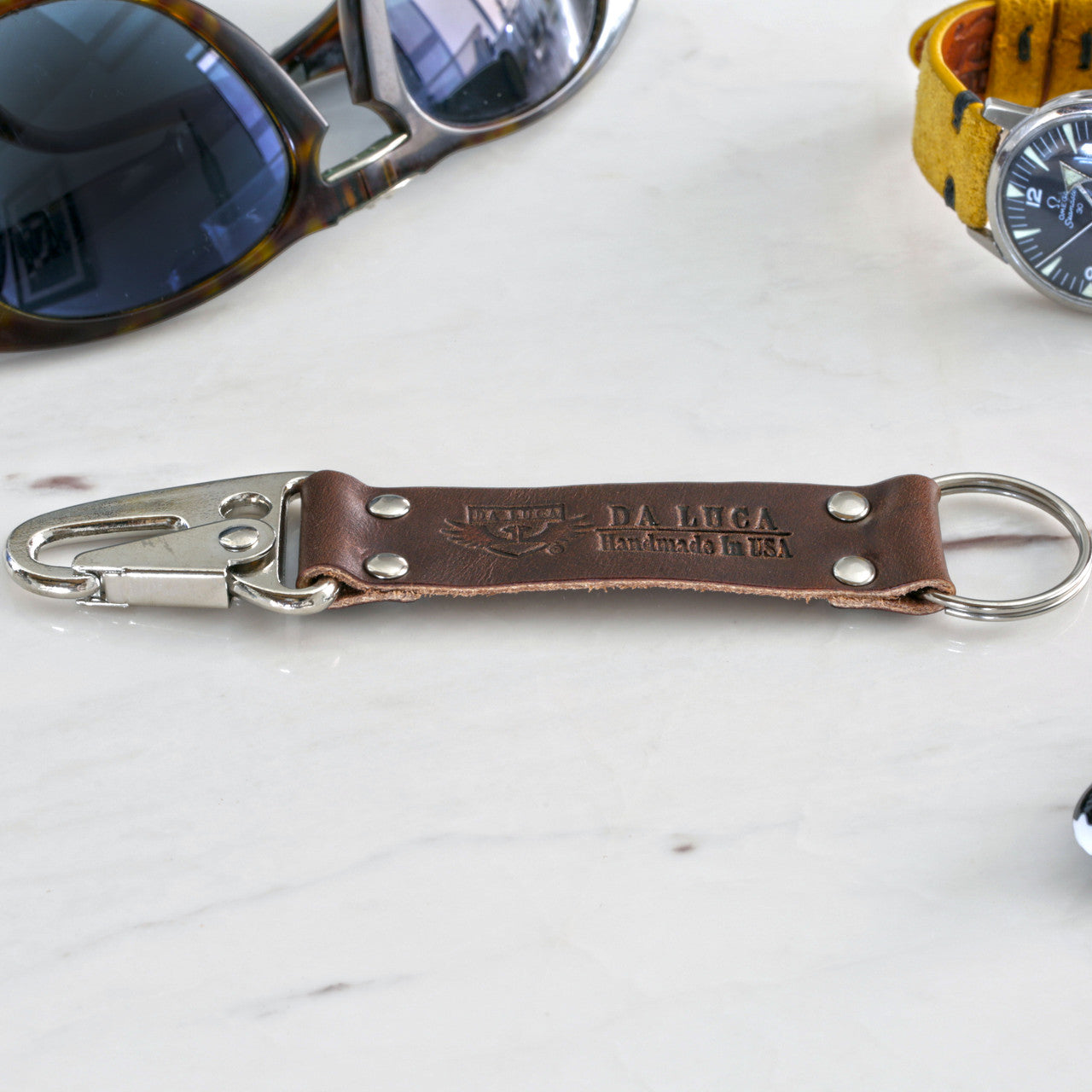 Close View Of Our Keychain Made From Genuine Horween Brown Chromexcel Leather and Polished Hardware by DaLuca Straps.