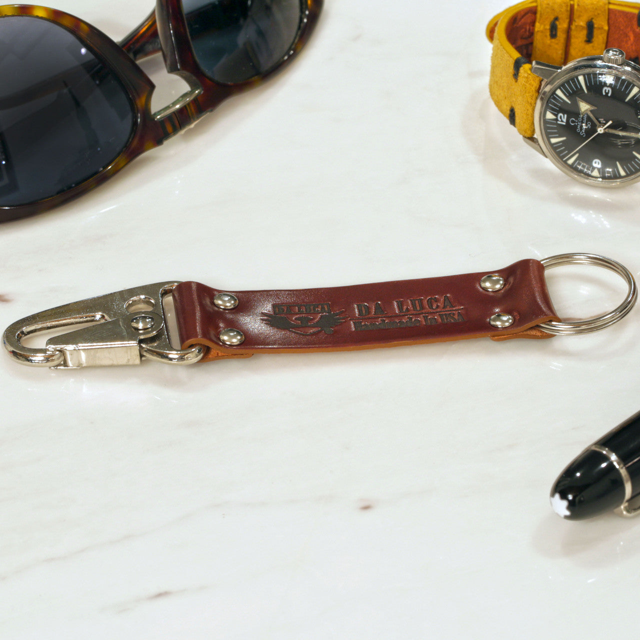 Close View Of Our Keychain Made From Genuine Horween Color 4 Shell Cordovan Leather and Polished Hardware by DaLuca Straps.