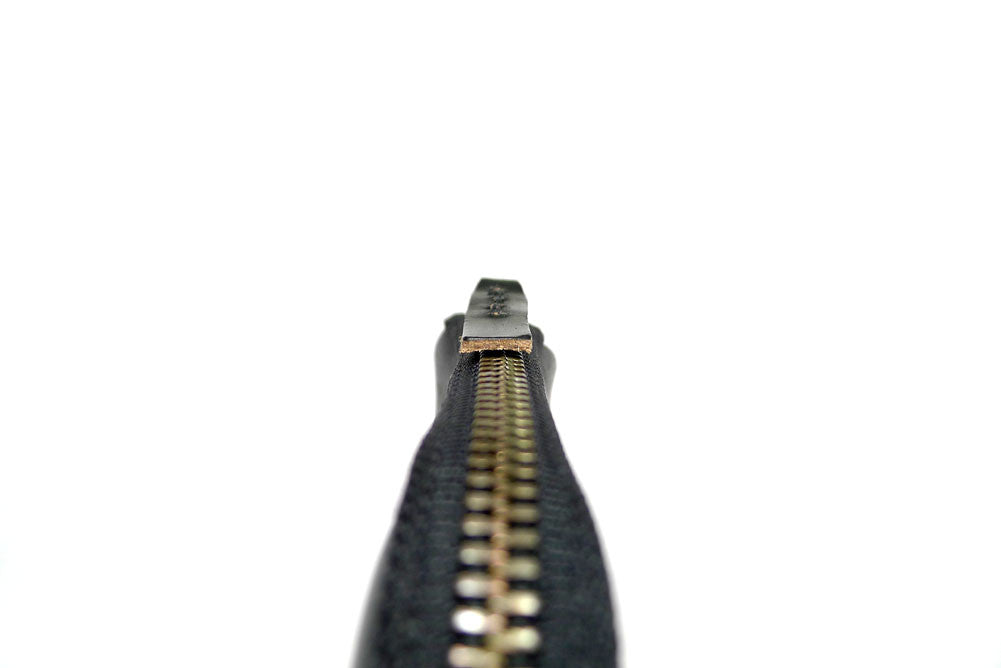 Detail Of A Handmade Zip Wallet Made From Horween Black Chromexcel Leather with a Black Zipper DaLuca Straps.