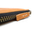 Zip Pull Detail Of Our Handmade Zip Wallet Made From Horween Natural Essex Leather with a Black Zipper DaLuca Straps.