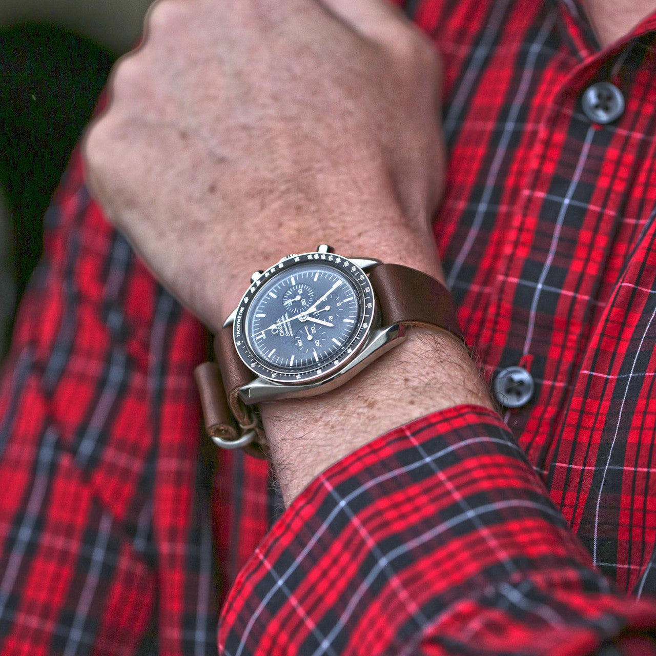 Military Single Piece Watch Strap Made From Horween Brown Chromexcel With A Matte Silver Buckle By DaLuca Straps.