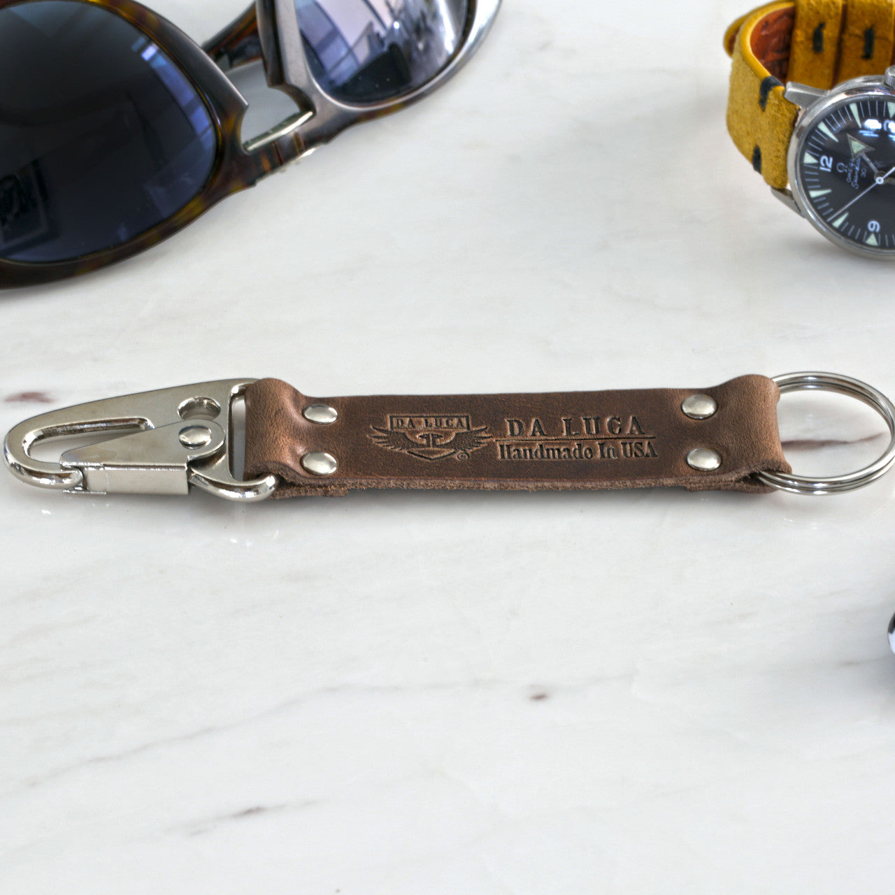 Close View Of Our Keychain Made From Genuine Horween Natural Chromexcel Leather and Polished Hardware by DaLuca Straps.