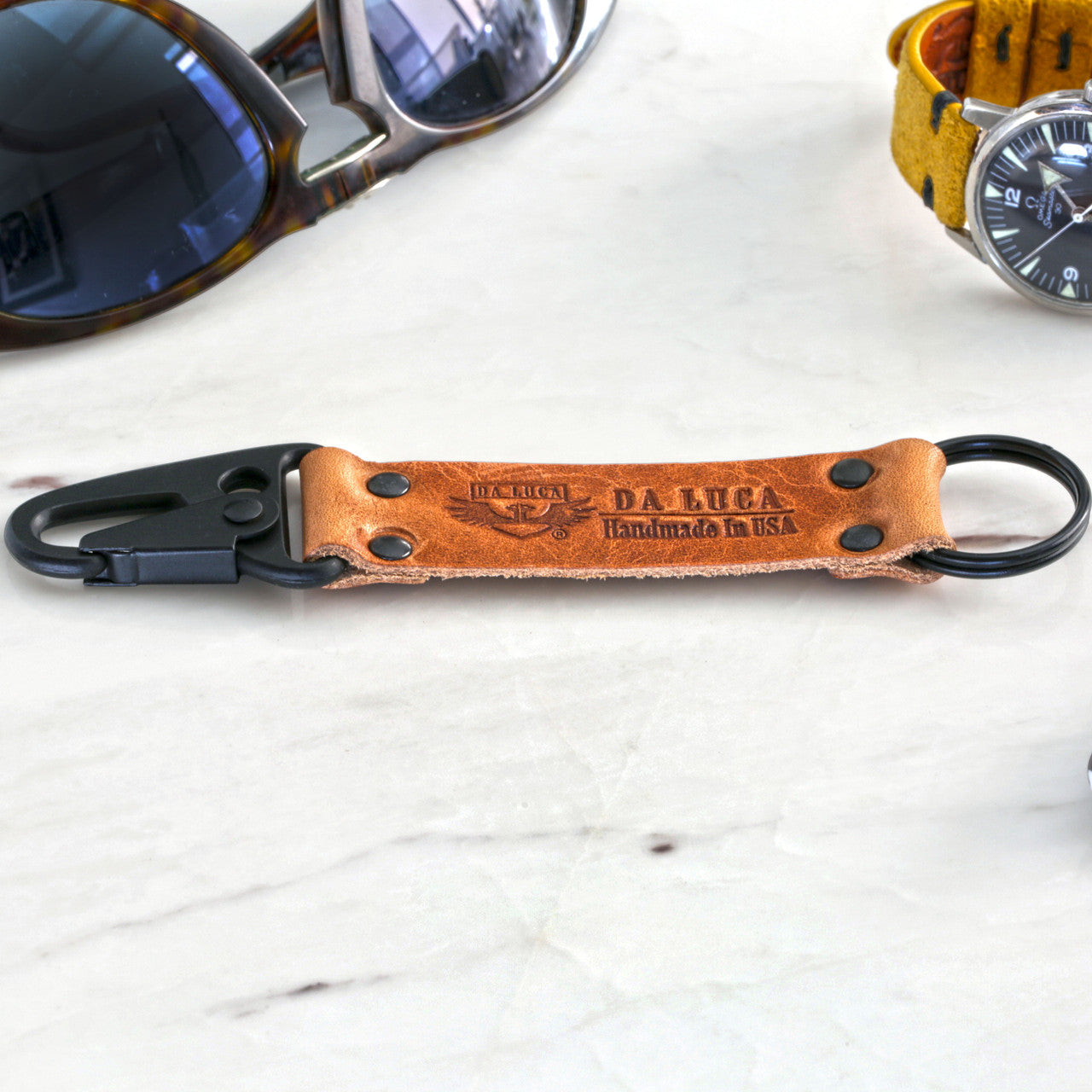 Close View Of Our Keychain Made From Genuine Horween Natural Dublin Leather and PVD Hardware by DaLuca Straps.