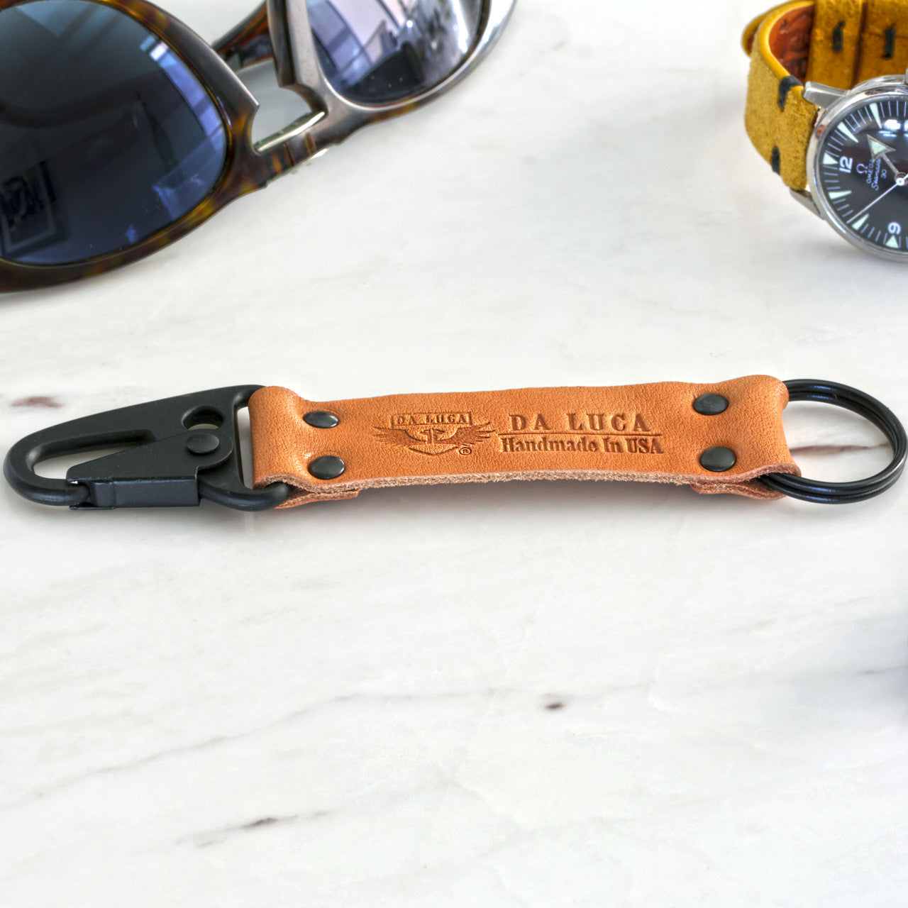 Close View Of Our Keychain Made From Genuine Horween Natural Essex Leather and PVD Hardware by DaLuca Straps.