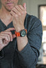 Orange Ballistic Nylon Military Watch Strap With A Matte Silver Buckle By DaLuca Straps.