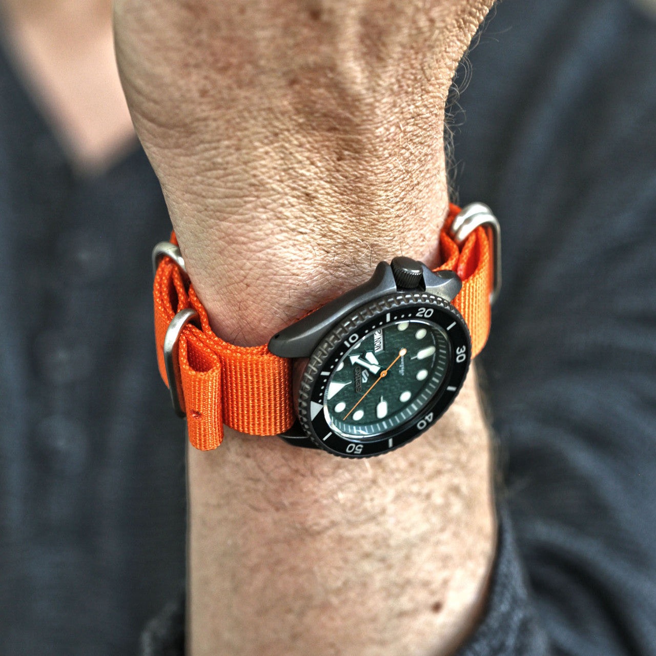 Orange Ballistic Nylon Military Watch Strap With A Matte Silver Buckle By DaLuca Straps.