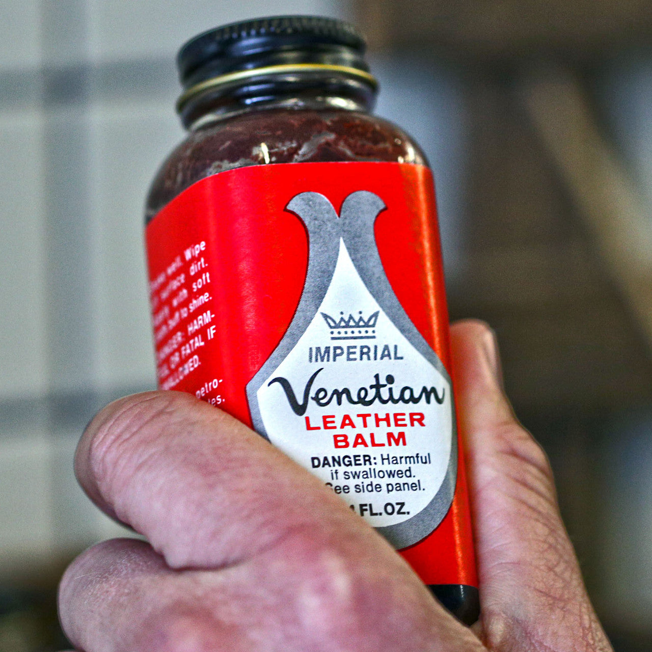 Venetian Cream in a 4oz Size with a Brown Color in a Glass Bottle And Metal Cap Lifestyle DaLuca Straps.