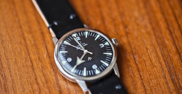 vintage omega seamaster 30 paf watch on a horween shell cordovan strap