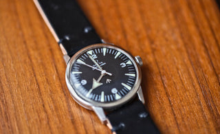 vintage omega seamaster 30 paf watch on a horween shell cordovan strap