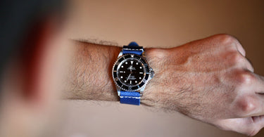 blue handmade leather watch band on a rolex submariner