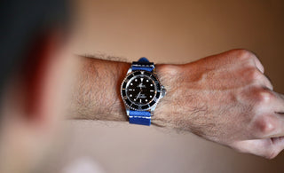 blue handmade leather watch band on a rolex submariner