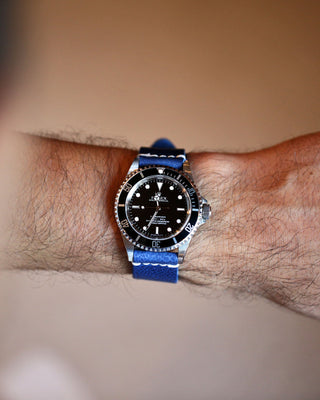 blue handmade leather watch band on a rolex submariner