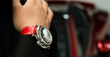 red handmade lizard watch band on a panerai 233 watch