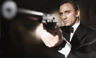 daniel craig james bond 007 silencer on gun pointing it