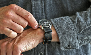 black chromexcel watch strap on an omega speedmaster pro watch