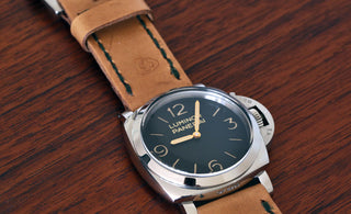 panerai 372 watch on a vintage swiss ammo pouch watch strap