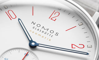 nomos glashutte neomatik watch dial