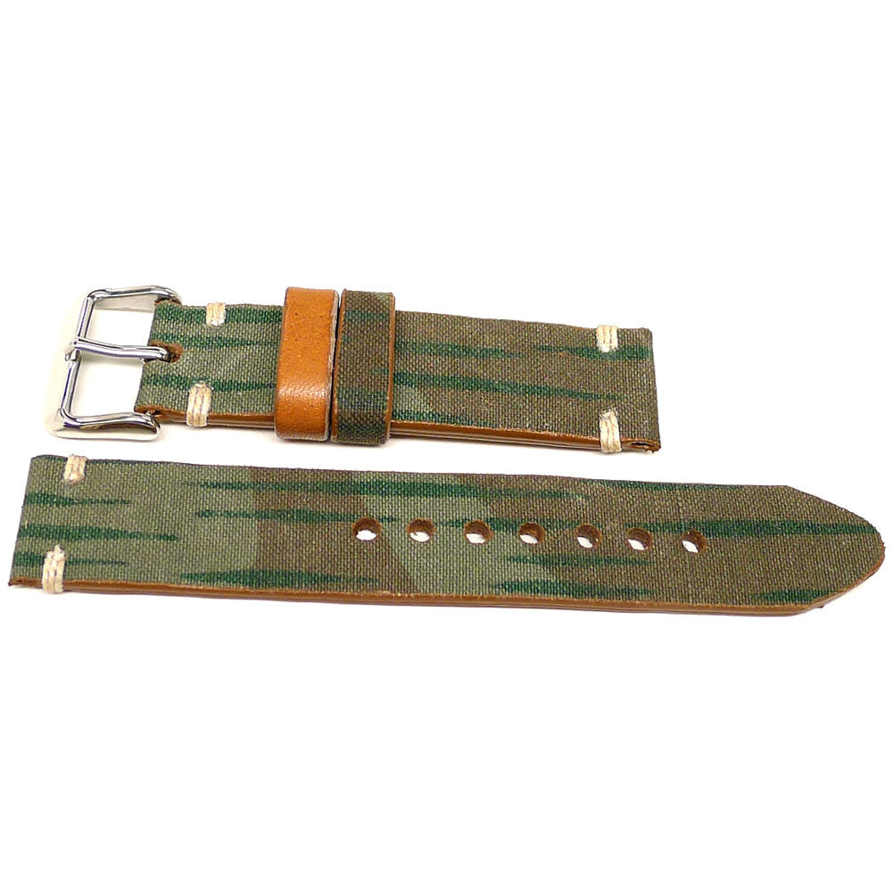 Amminmol watch strap in olive green and brown with streaked markings and an orange keeper, two pieces laid flat.