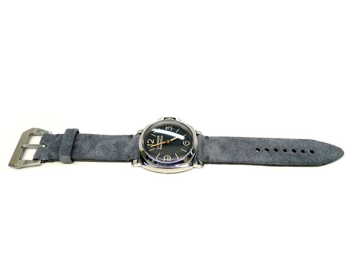 Gemma watch strap in charcoal gray with a textured surface, shown fitted to a watch.