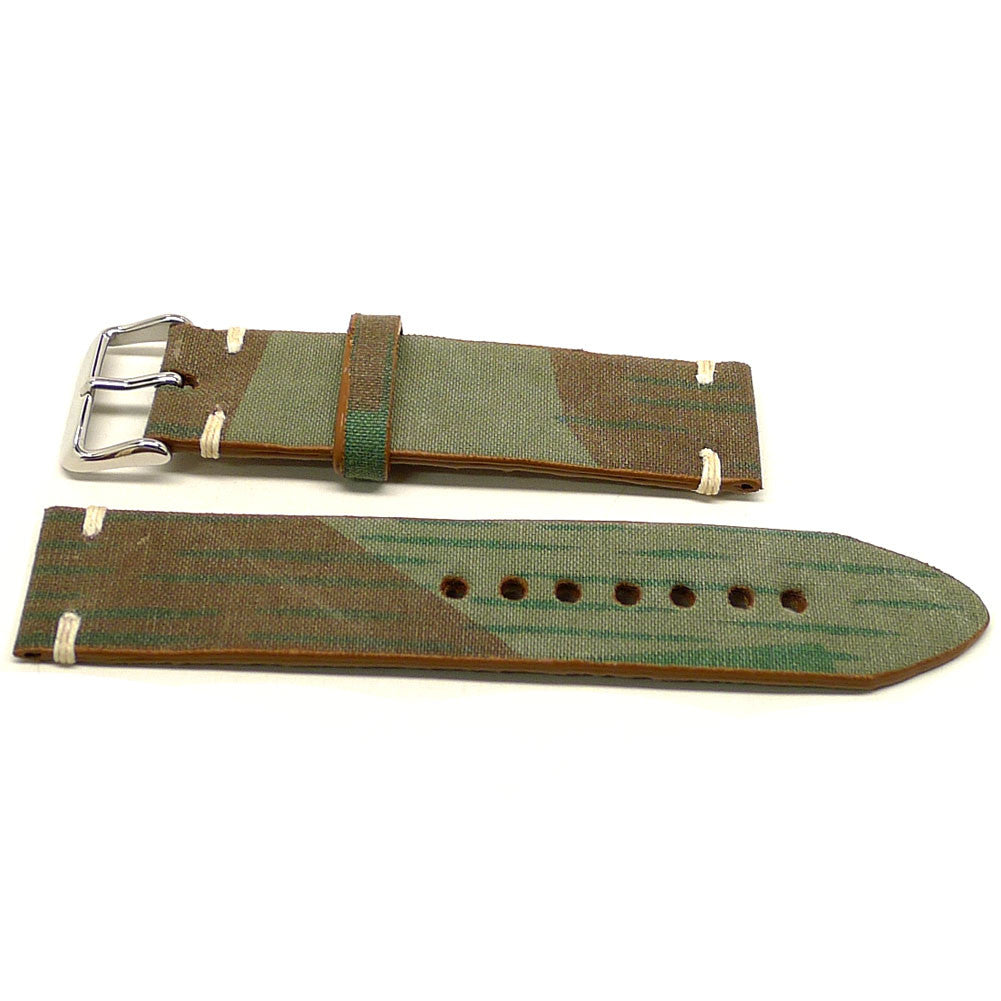 Montgomery watch strap in green and brown with broad diagonal markings and cream accent stitches, two pieces laid flat.