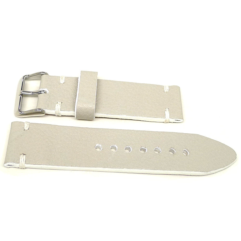 Tenzing watch strap in cream with white accent stitches, two pieces laid flat.