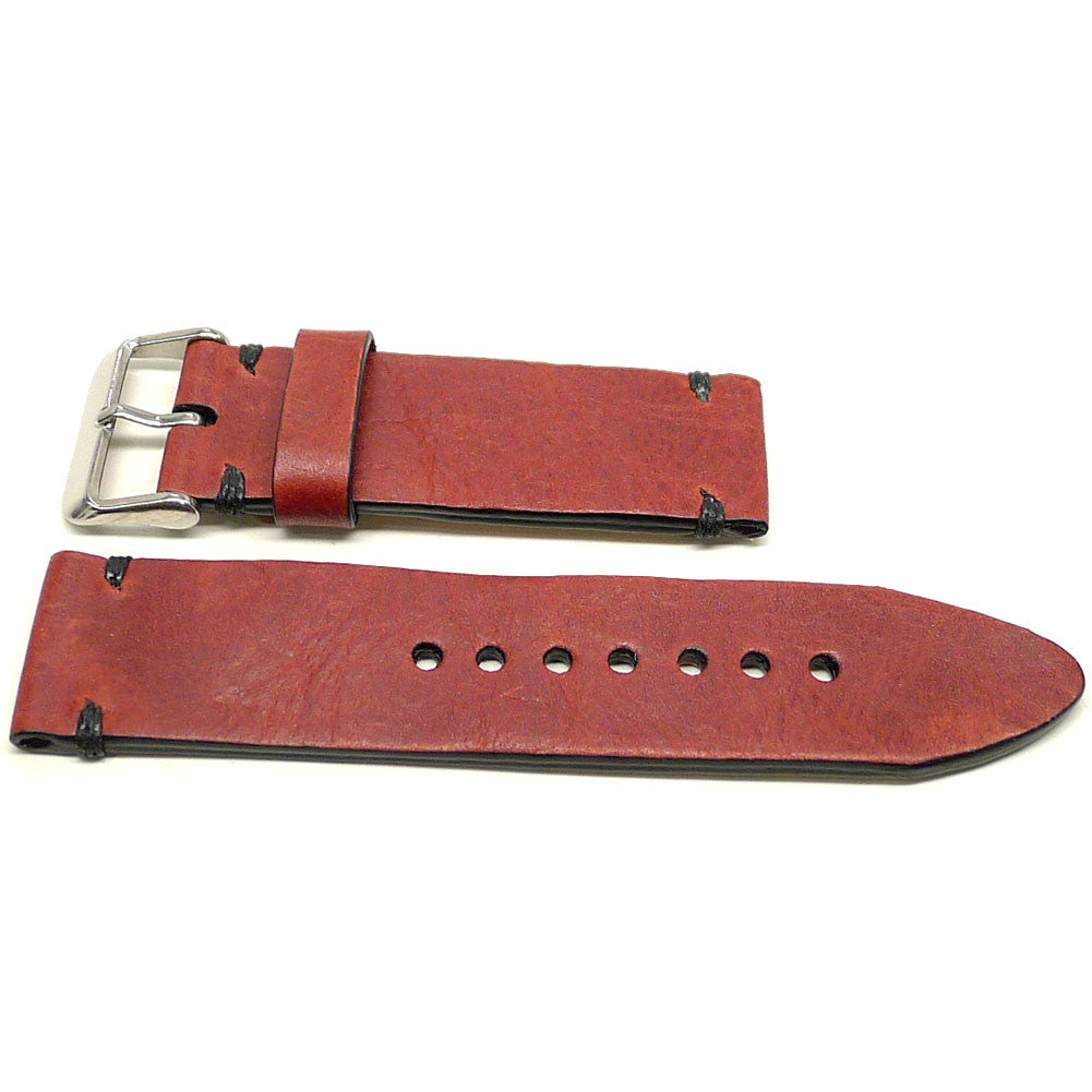 Vlanza watch strap in red with dark accent stitches, two pieces laid flat.