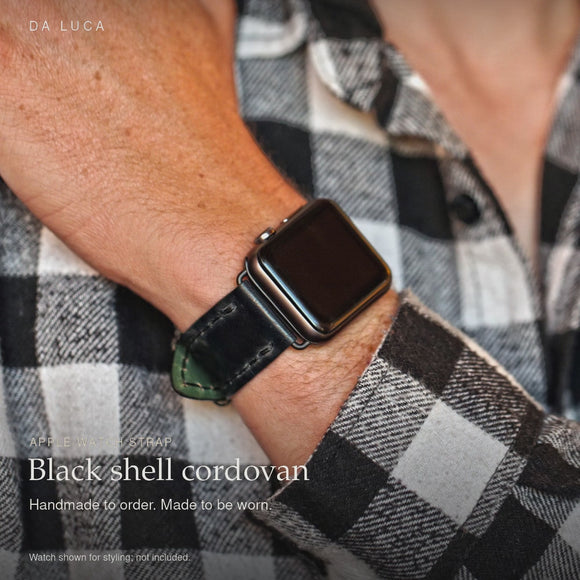 DA LUCA Black shell cordovan Apple Watch strap. Product details and wrist styling.