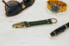 Keychain Made From Genuine Horween Green Shell Cordovan Leather and Antique Brass Hardware by DaLuca Straps.