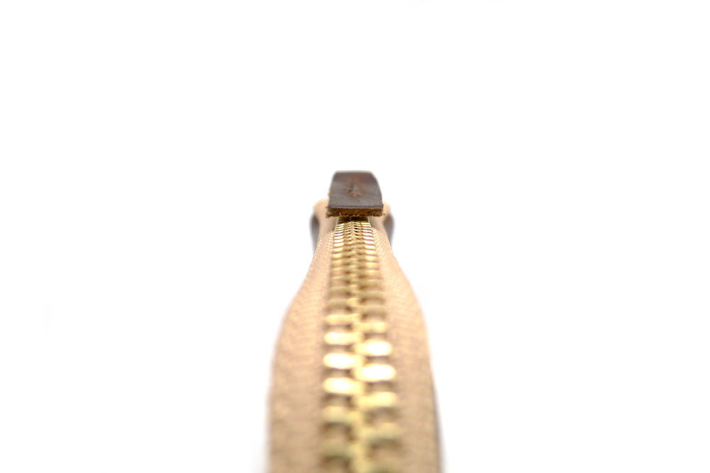 Detail Of A Handmade Zip Wallet Made From Horween Brown Chromexcel Leather with a Khaki Zipper DaLuca Straps.