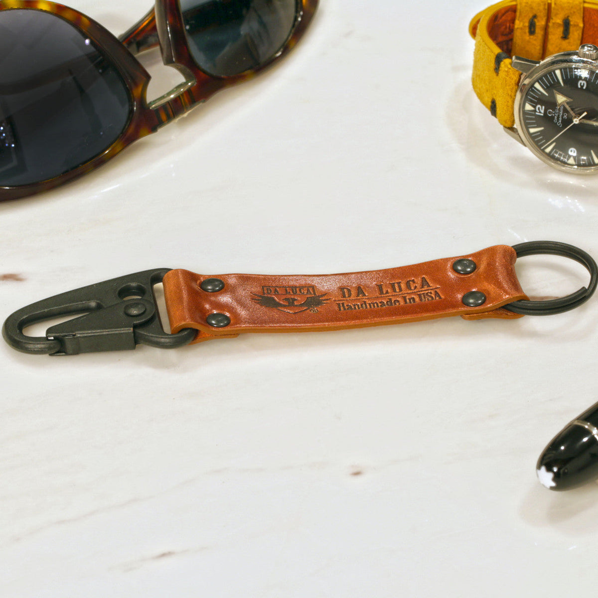 Close View Of Our Keychain Made From Genuine Horween Natural Shell Cordovan Leather and PVD Hardware by DaLuca Straps.